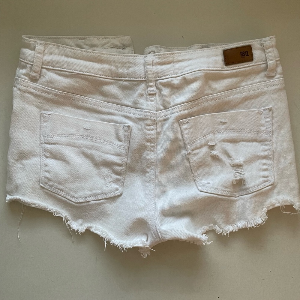 Distressed white shorts
